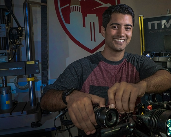 Yashar Behnam with a prosthetic prototype