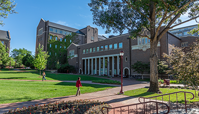 view of the Daniels College of Business in Spring